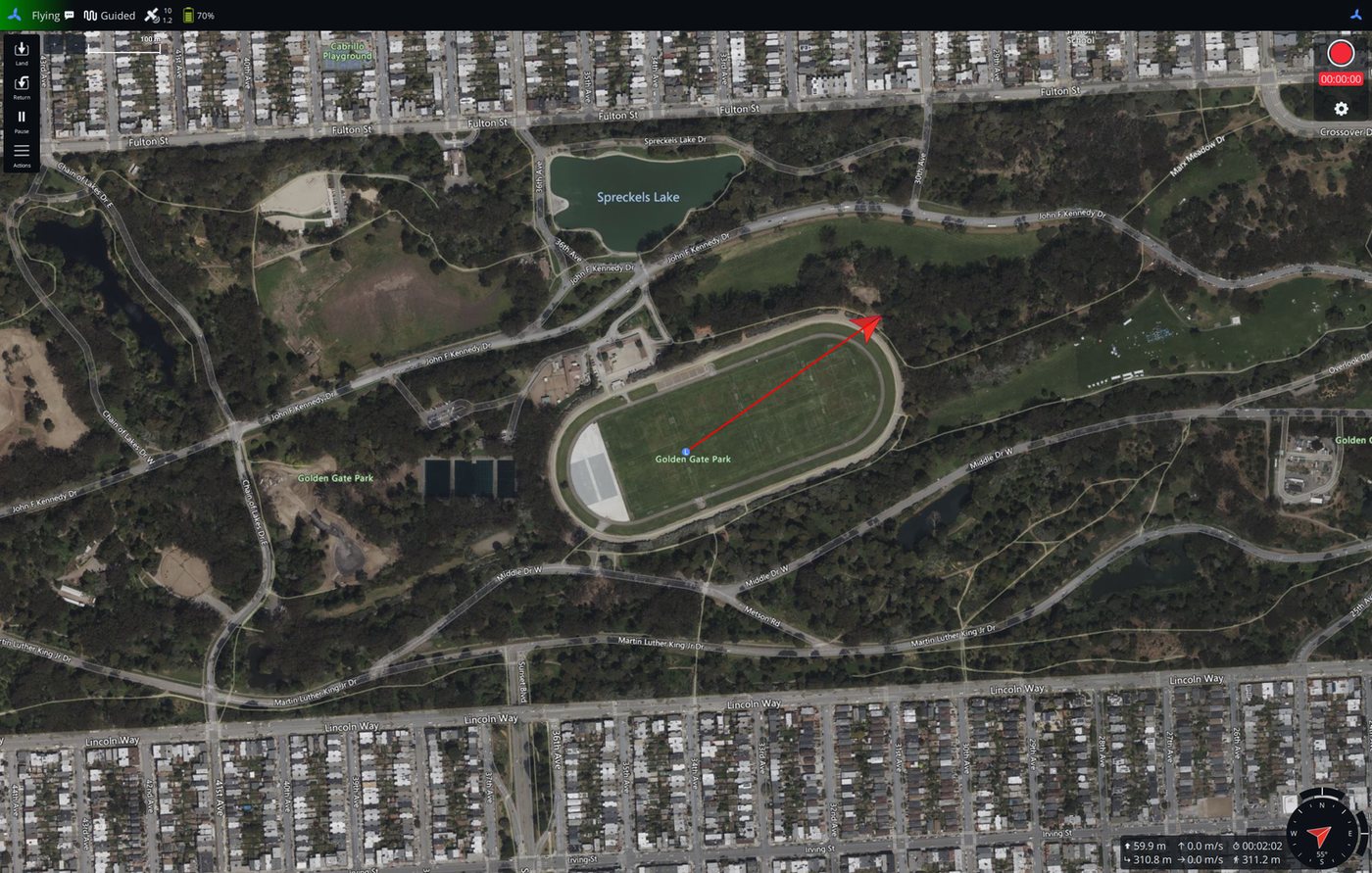 RotorLab GC Fly view: the aircraft airborne under guided control over a park, with the flown track, mode, and battery on the status bar and altitude, speed, and time in the corner.